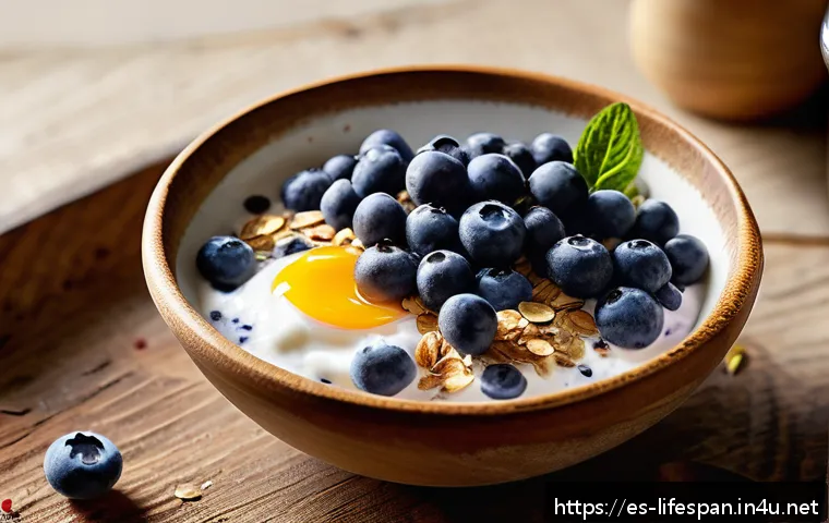 수명 연장에 좋은 식품 - A vibrant breakfast bowl featuring fresh blueberries, creamy natural yogurt, and a generous sprinkle...